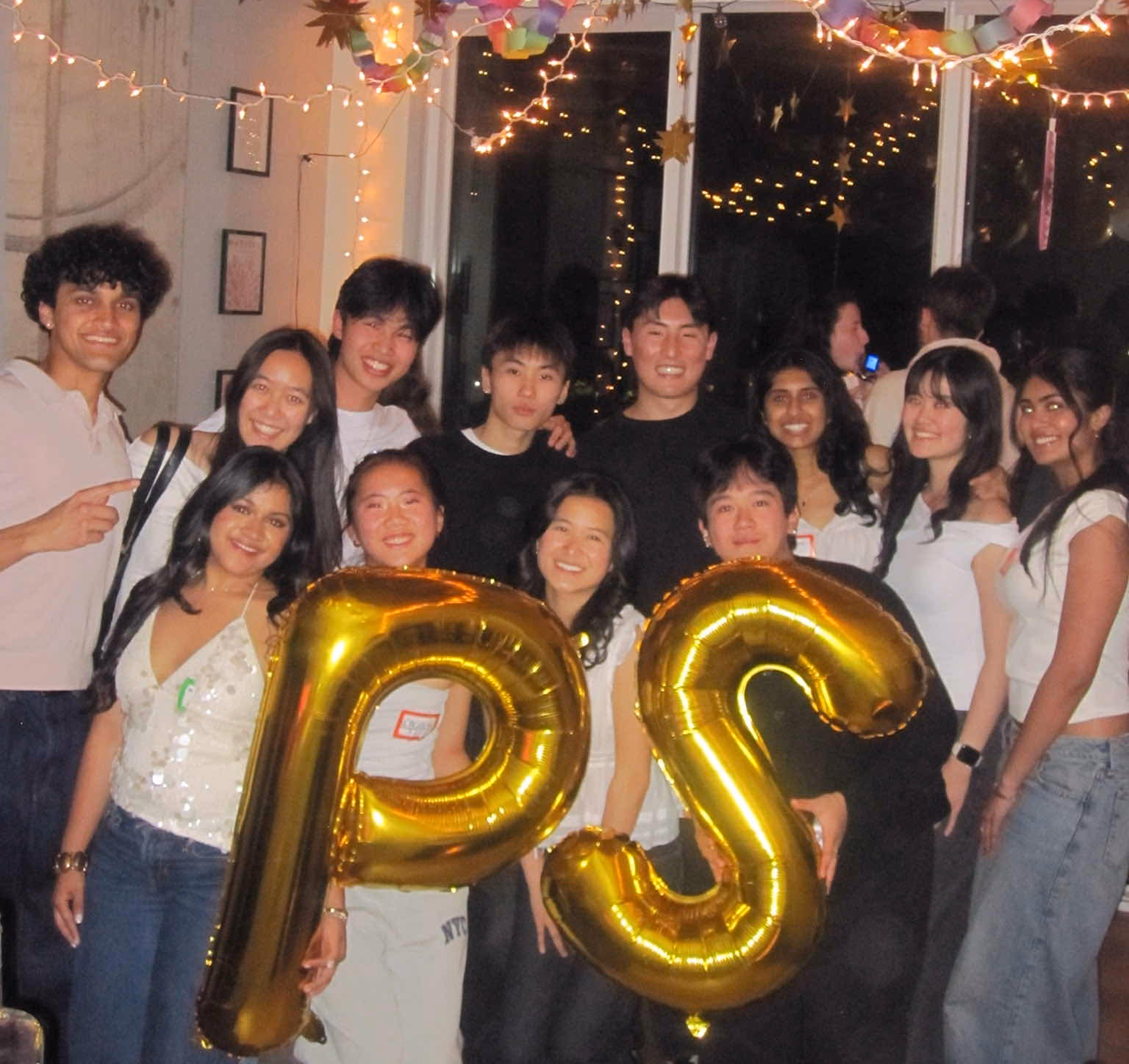 The cohort celebrating at a social